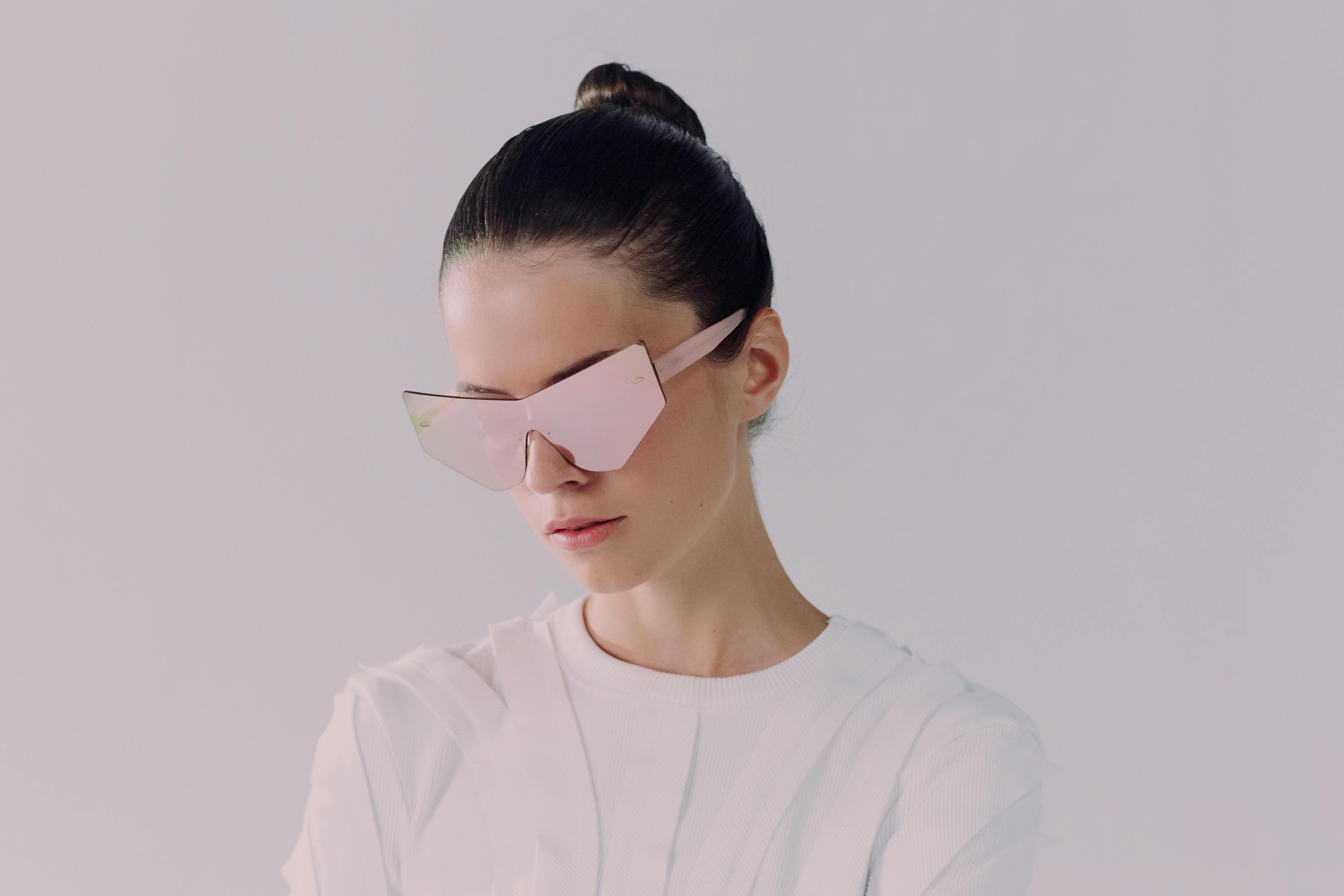 Unusual geometric eyewear frames on a design studio surface