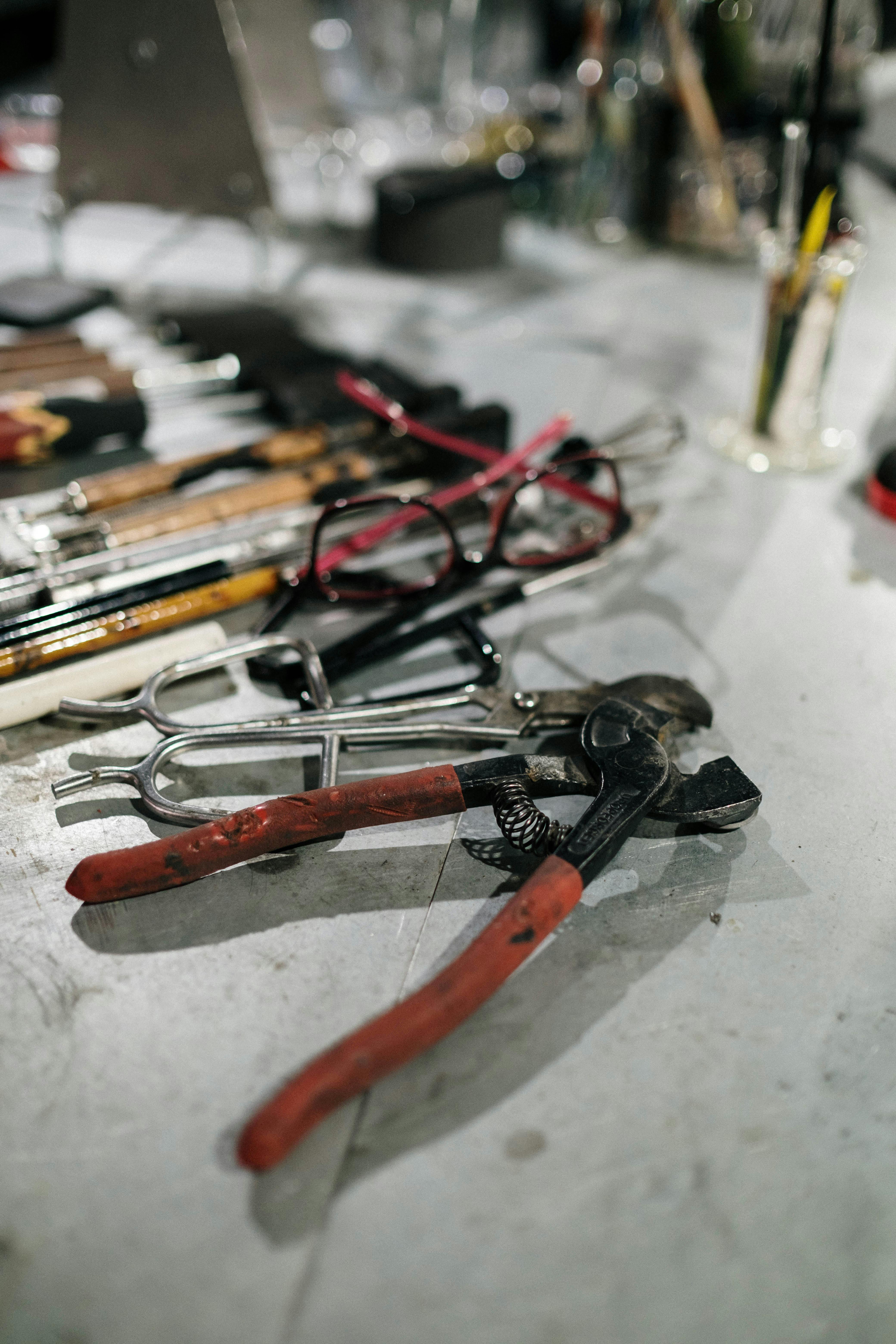 Small workshop with eyewear frames and artisan tools