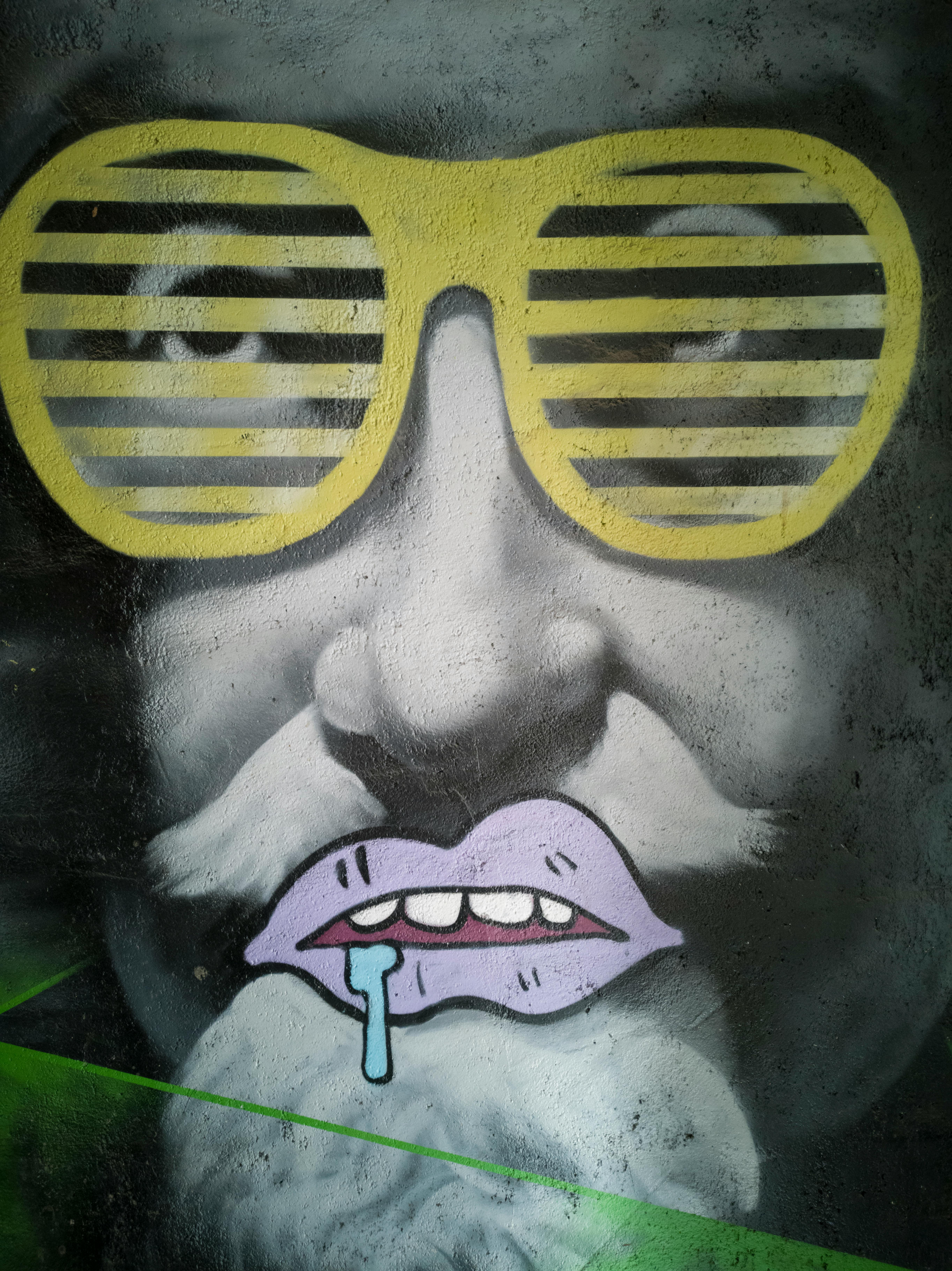 Pop art inspired illustration of a figure in distinctive glasses, abstract style